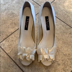 Ivory suede open toe heels